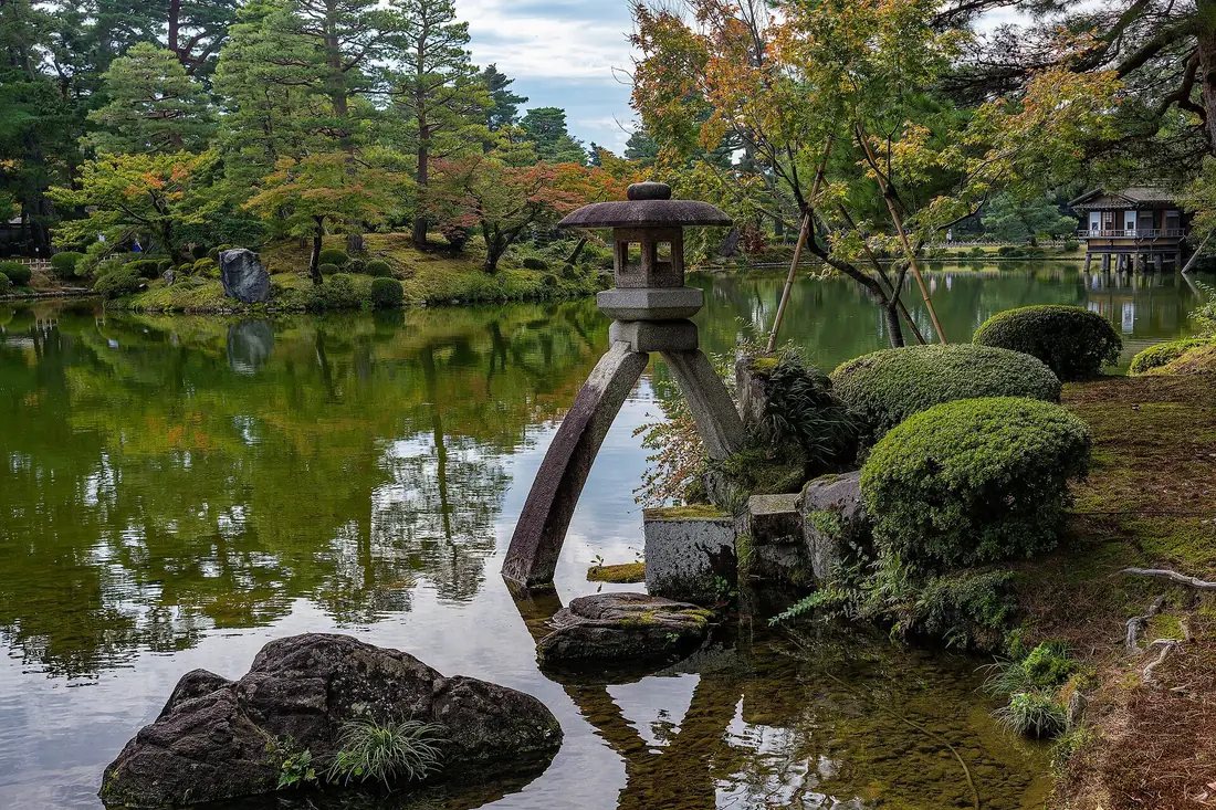 Kotojitoro stone lantern beside Kasumigaike Pond in Kenrokuen Garden