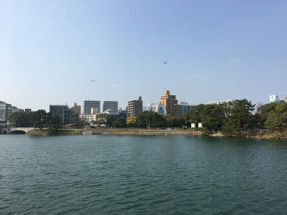Ohori Park pond with the Fukuoka city skyline on the far shore